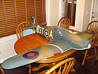 Name: 014.jpg
Views: 199
Size: 94.0 KB
Description: My other 2010/11 winter project, an ESM/KMP 82" Hawker Hurricane. Planning on putting the equivalent of what is in the Typhoon (not sure if it will be Turnigy/Turnigy setup or E-Flite/Castle Creations setup yet.)