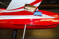 Name: DSC_9266.jpg
Views: 607
Size: 1.12 MB
Description: Slide the fin into position, place a piece of tape at the hinge line. Remember to cut away the film 3mm (1/8") inside of this mark.