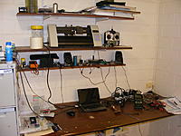 Name: picDSCF0063.jpg
Views: 452
Size: 109.6 KB
Description: On the other side of the room, the programming bench and paste-stencil cutter as well as some rudimentary testing gear.