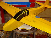 Name: P1120294.jpg
Views: 264
Size: 41.9 KB
Description: I used black trim tape and infilled with Zagi tape for the canopy design.