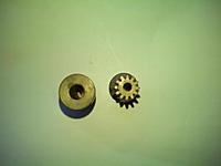 Name: emestarter5.jpg
Views: 435
Size: 10.7 KB
Description: You can see the small end of the gear has a smaller hole ID than 5mm. The bigger end is 5mm I think it was built this way to make the gear end stronger but I am not sure. This is a Trex 450 pinion