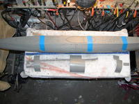 Name: DSCN0001.jpg
Views: 917
Size: 104.6 KB
Description: The hull and deck pieces all glued together (takes no time at all -- a very well engineered kit) and held together with tape, I prepared the doubler plates --, that hide the screw holes and strengthen the bond between the hull quarters -- for attachement.