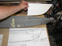 Name: DSCN0023.jpg
Views: 1035
Size: 76.5 KB
Description: Inserting the profile piece into the slit cut into the bow. I enlarged the drawing Chuck found for us to the scale of the kit and used that to mark-out the profile piece