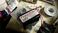 Name: 20130512_224822.jpg
Views: 184
Size: 105.9 KB
Description: The pack before I put it in semi-permanently in the battery box. I made the plugs accessible from the outside and used extensions to charge it without having to unscrew the box to get to it.