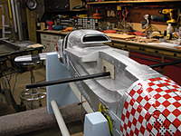 Name: FMS P-51 Mustang_Build_2-12-2010-0007.jpg
Views: 417
Size: 90.6 KB
Description: The CF rod fitted snugly in place and GG.