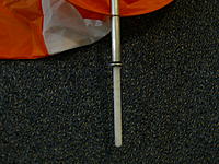 Name: P1000728.jpg
Views: 338
Size: 214.9 KB
Description: Details of the extension: plastic coat hangar rod epoxied into hollow sock shaft. Small 5/8" washer (3/8" hole) fits over rod and glued to shaft bottom to make a pivot stop.