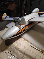 Name: IMG_3422.jpg
Views: 108
Size: 113.5 KB
Description: Fuselage cover was patterned from Hobby King FPV mounts. Rubber bands hold everything in place.