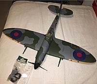 Name: pic1 strut covers 10-15-2021.jpg
Views: 19
Size: 265.6 KB
Description: My beloved Park Zone Spitfire Mk!  Sitting pretty with the new gear parts that I was able to acquire back in August 2021.