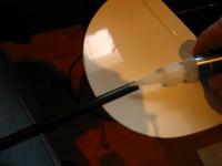 Name: gtail_0298.jpg
Views: 2067
Size: 49.3 KB
Description:  The tail boom was already attached to the fuse pod, so that alignment was already done.  I installed the vertical stab and used thin CA to tack it into place.  