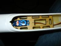 Name: hs55_0294.jpg
Views: 1709
Size: 72.4 KB
Description:  The fuse already had the cut out and servo mounts glued into the fuse. I was careful not to force the screws into the wood.  I found that if I drilled the hole small, that the wood would not splinter and break.