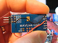 Name: IMG_7144.jpg
Views: 1729
Size: 196.9 KB
Description: I do not want to fry a 3rd one... so I connected the digital & video power rails direclty on the board. My minimOSD board (clone sold by Goodluckbuy) has no solder pad to connect the power lines. So I just put two pieces of wire instead.