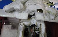 Name: B r o k e n _.jpg
Views: 171
Size: 134.7 KB
Description: Wing Saddle broken off second time.  Any  repair is going to be a real challenge.  Used kebab skewers pushed in just above the servos to hold the "T"-shaped piece of foam on to front of wing saddle glued on with Sika PU