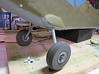 Name: L-5 landing gear. 2012-02-20 001.jpg
Views: 252
Size: 150.0 KB
Description: Gear blister and straw tube covering to make it look real