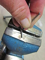 Name: How to install metal trunnions 2013-08-02 009.jpg
Views: 443
Size: 70.3 KB
Description: Use a nail or something along this train of thought to get the last few mm out of the stock strut.