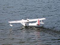 Name: ken_minicat.jpg
Views: 463
Size: 150.6 KB
Description: Ken Spokes maidens his very sharp "mini"-Catalina at Longham Lake, north of Bornemouth in Dorset, UK. July 2014.