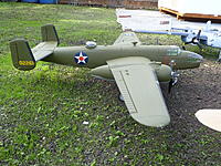 Name: P1050073.jpg
Views: 357
Size: 1.05 MB
Description: The new B-25B Ruptured Duck. She still needs a couple of aft fuselage windows and the yellow removed from her props.