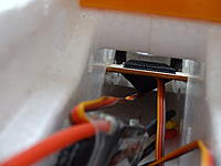 Name: DSC01064.jpg
Views: 187
Size: 366.4 KB
Description: The ESC goes under the battery bay and the THR wire is wrapped around one of the battery straps.