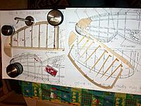 Name: 100_4781.JPG
Views: 327
Size: 238.4 KB
Description: Production of both rudder halves with their middle flat on the plans