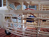 Name: 100_4038.jpg
Views: 198
Size: 248.6 KB
Description: Front cabin former 1/8 light ply with balsa added to make correct thickness, cut into main crutch for added security and servo installation.