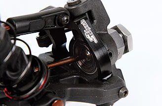 Composite steering blocks combined with 14-degree black anodized aluminium C-hubs  for precise steering.