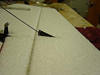 Name: DSC00123.jpg
Views: 488
Size: 124.9 KB
Description: Bury the aft end of the horn deep into the aileron but keep the control end just flush with the aileron.  I used Hot Glue here.