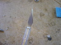 Name: DSC00290.jpg
Views: 330
Size: 191.3 KB
Description: Tip:  Don't push the blade all the way in and leave it as long as possible.  This will allow you to cut all the way through the fuse.