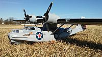 Name: pby5a.jpg
Views: 155
Size: 708.0 KB
Description: My latest project plane, Dynam 58" PBY Catalina, another "preflown".  It was a stock plane and damaged when I got a good deal on it. I did the repairs and some  mods. A really nice flying plane....... good looker too.