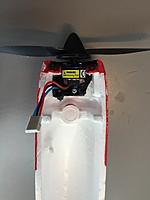 Name: 4.jpg
Views: 197
Size: 213.3 KB
Description: Initial fitment of the UMX Beast 3D Prop Adapter CA'd in.  Note that in order to keep Steerable Nose Wheel functioning, alterations to the Prop Adapter was necessary until full range of motion with the Nose Wheel  was achieved.