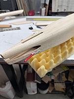 Name: IMG_1768.jpg
Views: 11
Size: 2.61 MB
Description: Push rod outer housings are secured using micro ballon filler mixed with resin.  Strong and easy to sand!