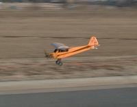Name: cub02.jpg
Views: 256
Size: 45.1 KB
Description: Excuse the blury pic.  I was flying and taking the pic at the same time.