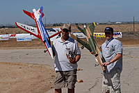 Name: DSC_0213.jpg
Views: 636
Size: 92.2 KB
Description: Greg and me holding our EB's at Cal Jets 2006.  A basic paint scheme devoid of weathering or markings as of this early picture!