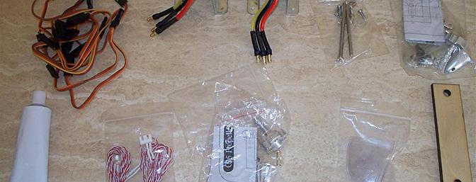 The motors are shown here already mounted to their brackets.  Shown too are the contents of the hardware bag and other miscellaneous items including the LEDs for the wingtips.