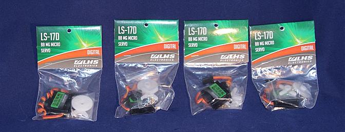The LHS Electronics aileron servos are shown fresh out of the box.