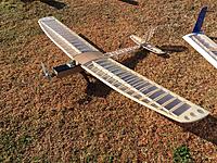 Name: buzz w sparrow.JPG
Views: 245
Size: 1.09 MB
Description: Just like new and at the hand of the original builder, no less.  That ribless wing design is incredibly lightweight, but it requires care while handling it.  The tip of the flying wing at right is a Buzz design.