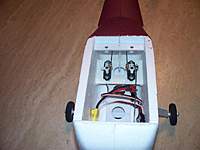Name: cessna servos.jpg
Views: 374
Size: 49.8 KB
Description: Here are the original Tactic servos with the speed control nearly in place.  Note the pushrod leading up to the Du-Bro nosewheel.  I may make a better pushrod soon.