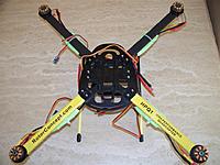 Name: hpq1 top.jpg
Views: 216
Size: 103.4 KB
Description: The stripped-down frame and the motors less their removable endbells are shown here with the Afro ESCs temporarily tie-wrapped in place.